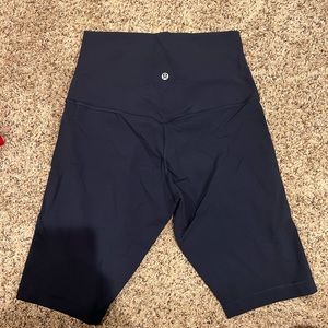 NWOT align 10’ biker shorts. Size 8. Color is navy.